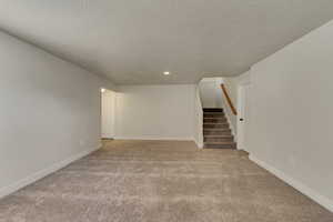 Interior space featuring a textured ceiling