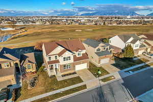 Birds eye view of property featuring a mountain view