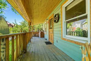 Wooden deck with a porch