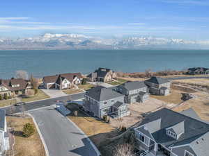 Drone / aerial view with a water and mountain view