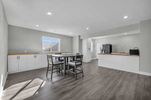 Dining space featuring hardwood / wood-style flooring