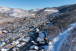 Snowy aerial view with a mountain view