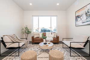 Living area with wood-type flooring