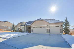 View of front of property with a garage