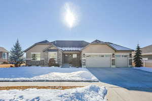 View of front of home featuring a garage