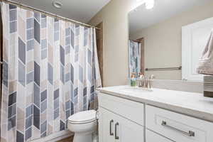 Bathroom featuring toilet and vanity