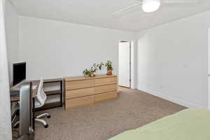 Office with light colored carpet