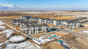 Snowy aerial view with a mountain view