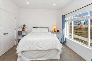 View of carpeted bedroom