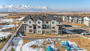 Snowy aerial view with a mountain view