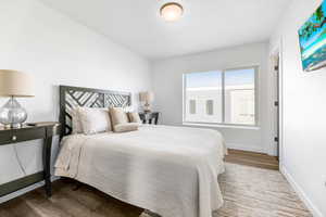 2nd Bedroom with hardwood / wood-style floors