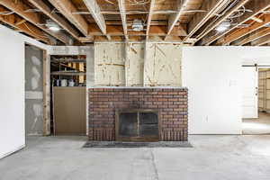 Basement featuring a fireplace