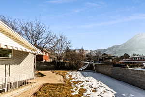 View of yard with a mountain view and a patio