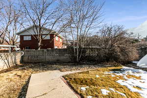 View of yard covered in snow