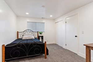 Bedroom featuring carpet flooring