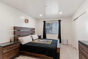 Bedroom featuring light hardwood / wood-style flooring