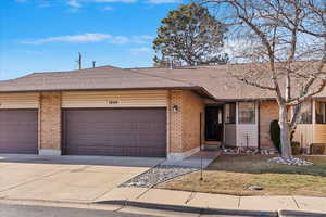 Single story home featuring a garage