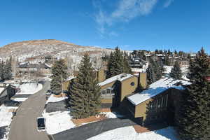 Snowy aerial view with a mountain view