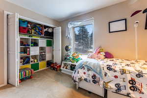 Bedroom featuring carpet flooring