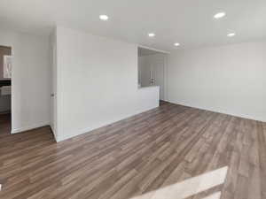 Spare room with hardwood / wood-style flooring