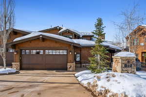 View of front of property featuring a garage