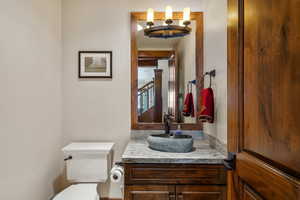 Bathroom with toilet and vanity