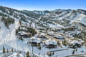 Snowy aerial view with a mountain view