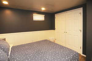 Unfurnished bedroom featuring a closet and carpet flooring