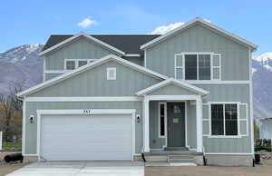 View of front of property with a mountain view