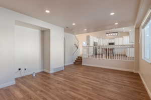 Unfurnished room featuring hardwood / wood-style floors