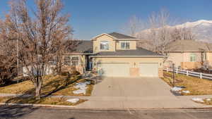 Front of property with a mountain view