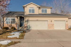 View of front of house with a garage