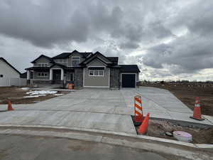 Craftsman-style home with a garage