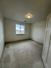 Spare room featuring a textured ceiling