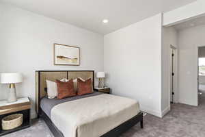 View of carpeted bedroom. This is the model home.