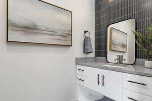 Bathroom with vanity. This is the model home.