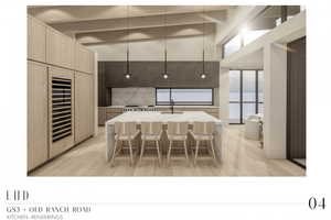 Kitchen with light hardwood / wood-style floors, sink, a breakfast bar, a center island with sink, and beam ceiling