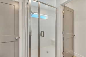 Bathroom featuring walk in shower