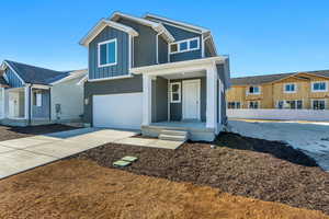 View of front of property with a garage