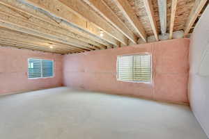 Empty room featuring concrete floors