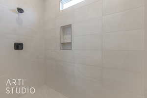 Bathroom with tiled shower