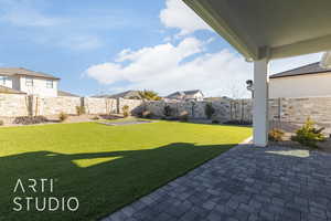 View of yard with a patio