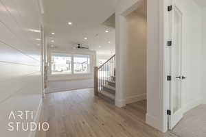 Hallway featuring light hardwood / wood-style floors