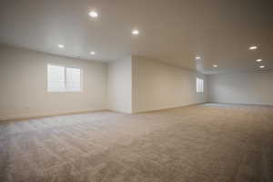 Spare room with light colored carpet