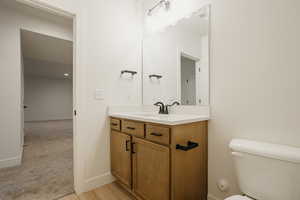 Bathroom featuring toilet and vanity