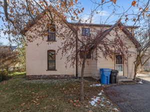 Exterior space featuring a lawn