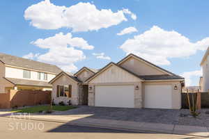 View of front of property featuring a garage