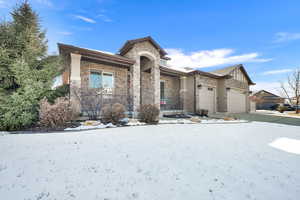 View of front of home featuring a garage