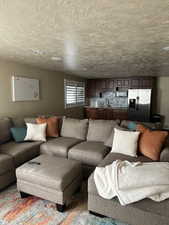 Living room with a textured ceiling