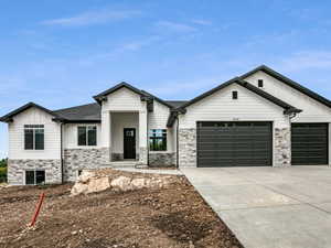 Modern farmhouse style home with a garage